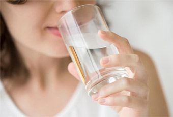 drinking water while singing